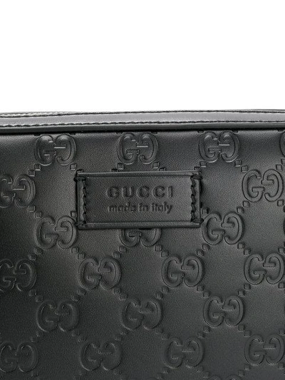 Shop Gucci 'signature' Clutch - Schwarz In 1000 -  Black
