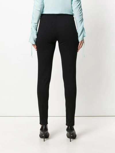 Shop Versace Slim Fit Trousers - Black