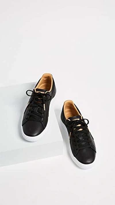 Shop Puma Clyde Core Leather Sneakers In Black