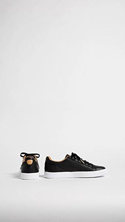 Shop Puma Clyde Core Leather Sneakers In Black