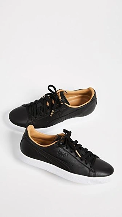 Shop Puma Clyde Core Leather Sneakers In Black