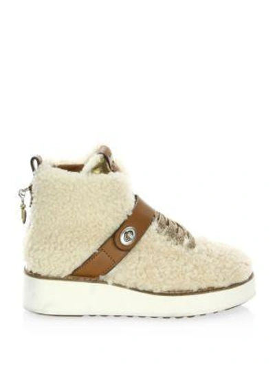 Shop Coach Urban Hiker Shearling Wedge Boots In Natural