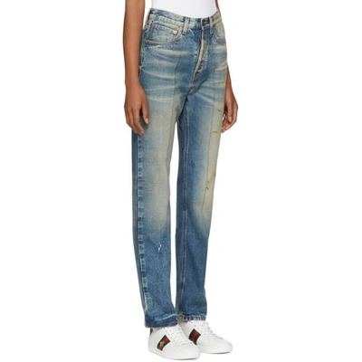 Shop Gucci Blue Butterfly Appliqué Jeans