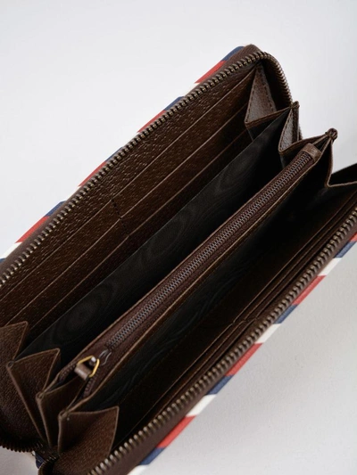 Shop Gucci Courier Supreme Zip Around Wallet In Brown