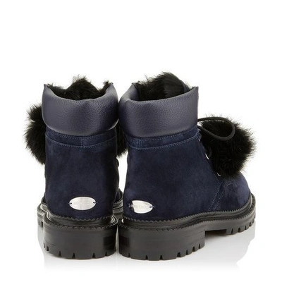 Shop Jimmy Choo Elba Flat Navy Suede Boots With Fur Pom Poms