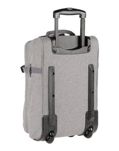 Shop Eastpak Wheeled Luggage In Grey