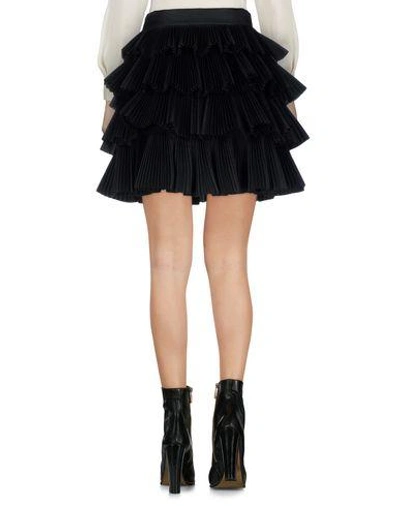 Shop Capucci Mini Skirt In Black
