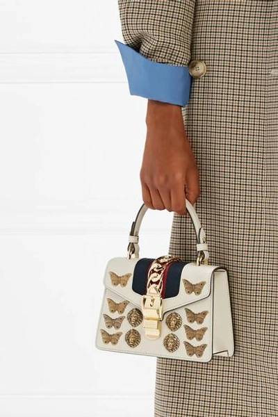 Shop Gucci Sylvie Mini Embellished Chain-trimmed Leather And Canvas Shoulder Bag In White