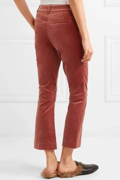 Shop Frame Cropped Cotton-blend Velvet Flared Pants In Brick