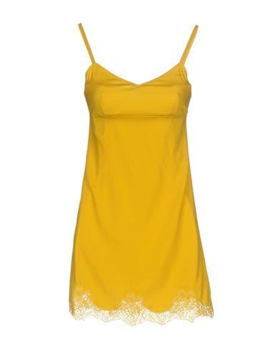 Shop Dolce & Gabbana Slips In Yellow