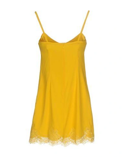 Shop Dolce & Gabbana Slips In Yellow