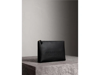 Shop Burberry Large Embossed Leather Zip Pouch In Black