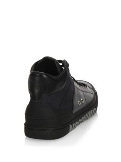 Shop Moschino Mid-top Lace-up Sneakers In Black