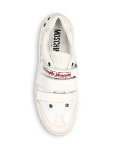 Shop Moschino Low-top Grip-tapesneakers In White