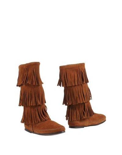 Shop Minnetonka Boots In Camel