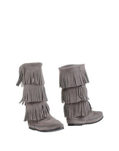 Shop Minnetonka Boots In Grey