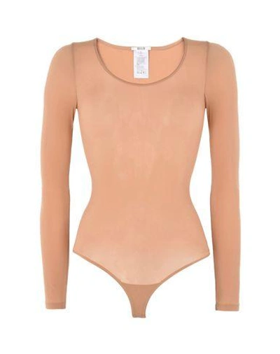 Shop Wolford Bodysuit In Pale Pink