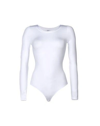 Shop Wolford Bodysuit In White