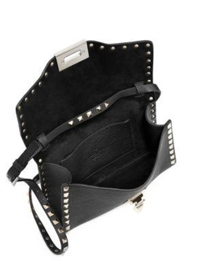 Shop Valentino Garavani Rockstud Medium Leather Crossbody Bag In Poudre