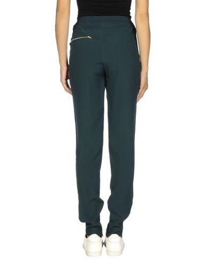 Shop Sandro Casual Pants In Green