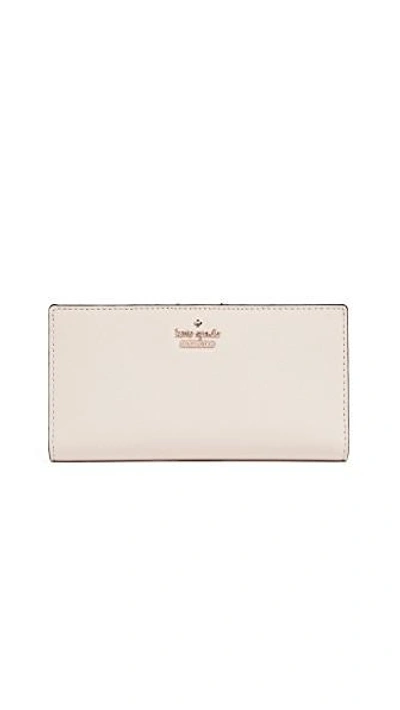 Shop Kate Spade Cameron Street Stacy Snap Wallet In Tusk