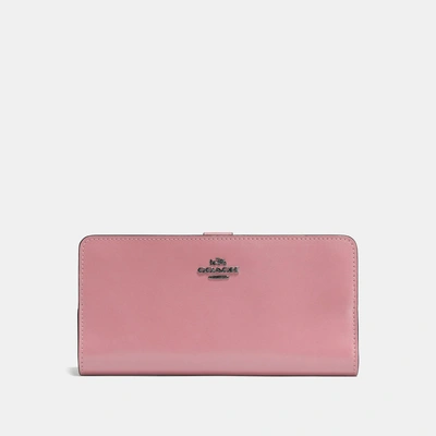 Shop Coach Skinny Wallet In Dusty Rose/dark Gunmetal