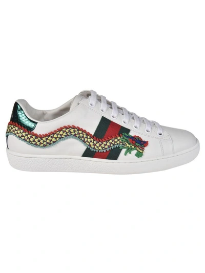 Shop Gucci Dragon Sneakers In White