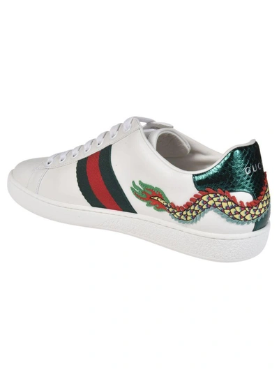 Shop Gucci Dragon Sneakers In White