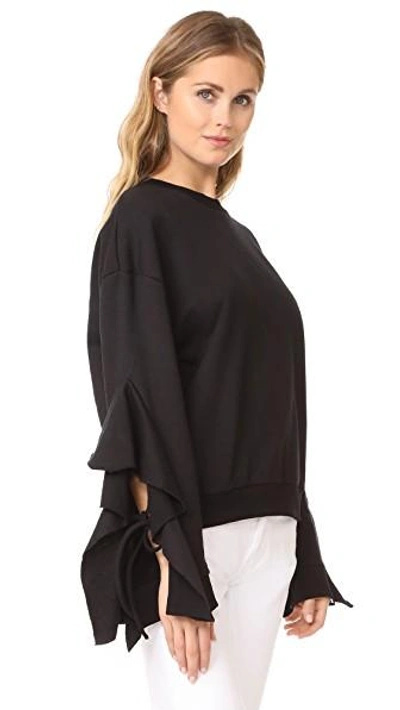 Shop Joa Cascade Sleeve Sweatshirt In Black