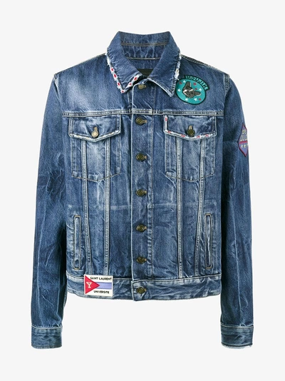 Shop Saint Laurent Multi-patch Distressed Denim Jacket In Blue