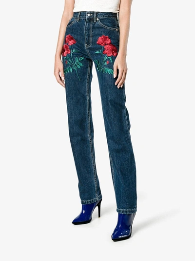 Shop Adam Selman Rodeo Rose Embroidered Jeans In Blue