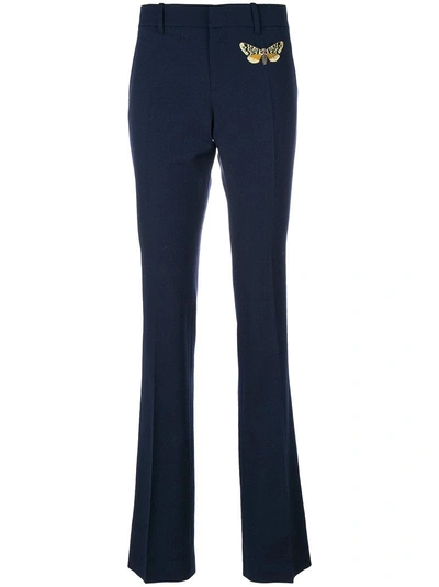 Shop Gucci Moth Embroidered Flared Trousers