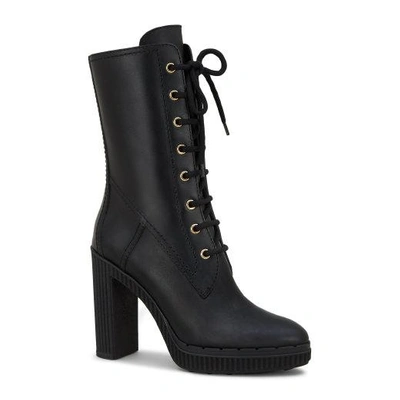 Shop Tod's Boots In Leather In Black