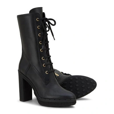 Shop Tod's Boots In Leather In Black