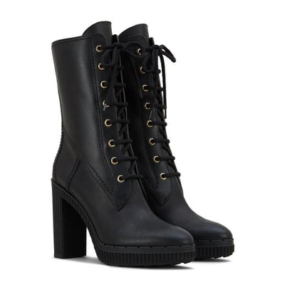 Shop Tod's Boots In Leather In Black