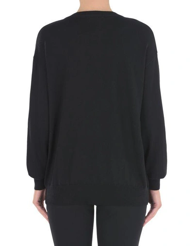 Shop Moschino Long-sleeve-sweater In Black