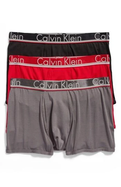Shop Calvin Klein Men's  3-pack Comfort Microfiber Trunks In Black/ Empower/ Grey Sky