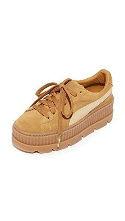 Shop Puma Cleated Sneakers In Golden Brown/lark