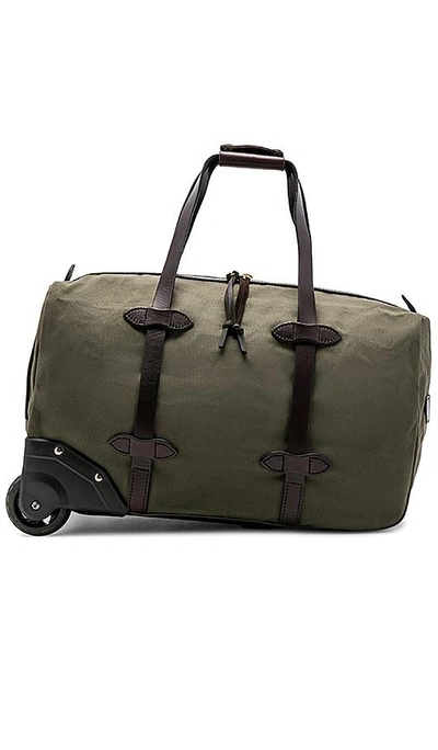 Shop Filson Small Rolling Duffle In Army. In Otter Green