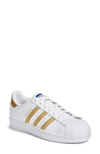 Shop Adidas Originals Superstar Sneaker In White/ Burgundy/ Gold