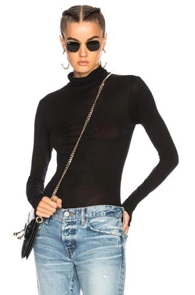 Shop Enza Costa Fitted Turtleneck Top In Black