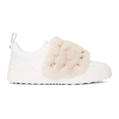 Shop Valentino White  Garavani Fur Laceless Rockstud Sneakers In 50z Pink