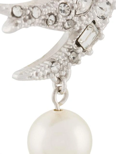 Shop Miu Miu Crystal And Faux Pearl Embellished Swallow Earrings In Metallic