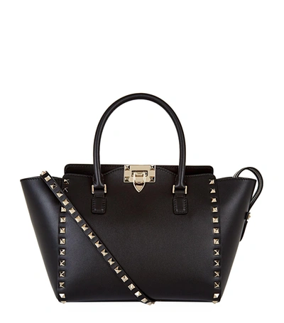 Shop Valentino Small North/south Rockstud Tote, Black In Red