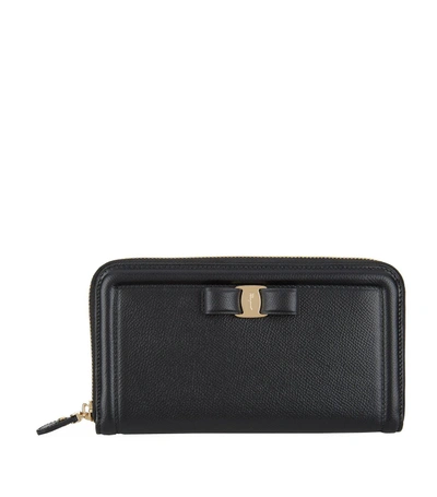 Shop Ferragamo Vara Bow Leather Zip Around Wallet In Black