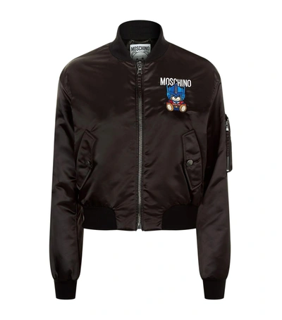 Shop Moschino Teddy Transformers Bomber Jacket In Multi