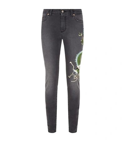 Shop Gucci Appliqué Dragon Jeans In Multi