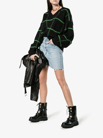 Shop Dolce & Gabbana Biker Boots With Button Embellishment In Black