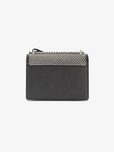 Shop Saint Laurent Black Studded Sunset Monogram Bag