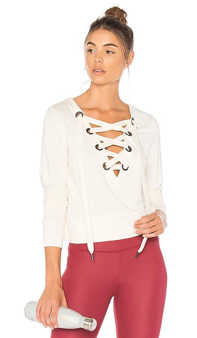 Shop Alo Yoga Ideal Long Sleeve Top In Ivory